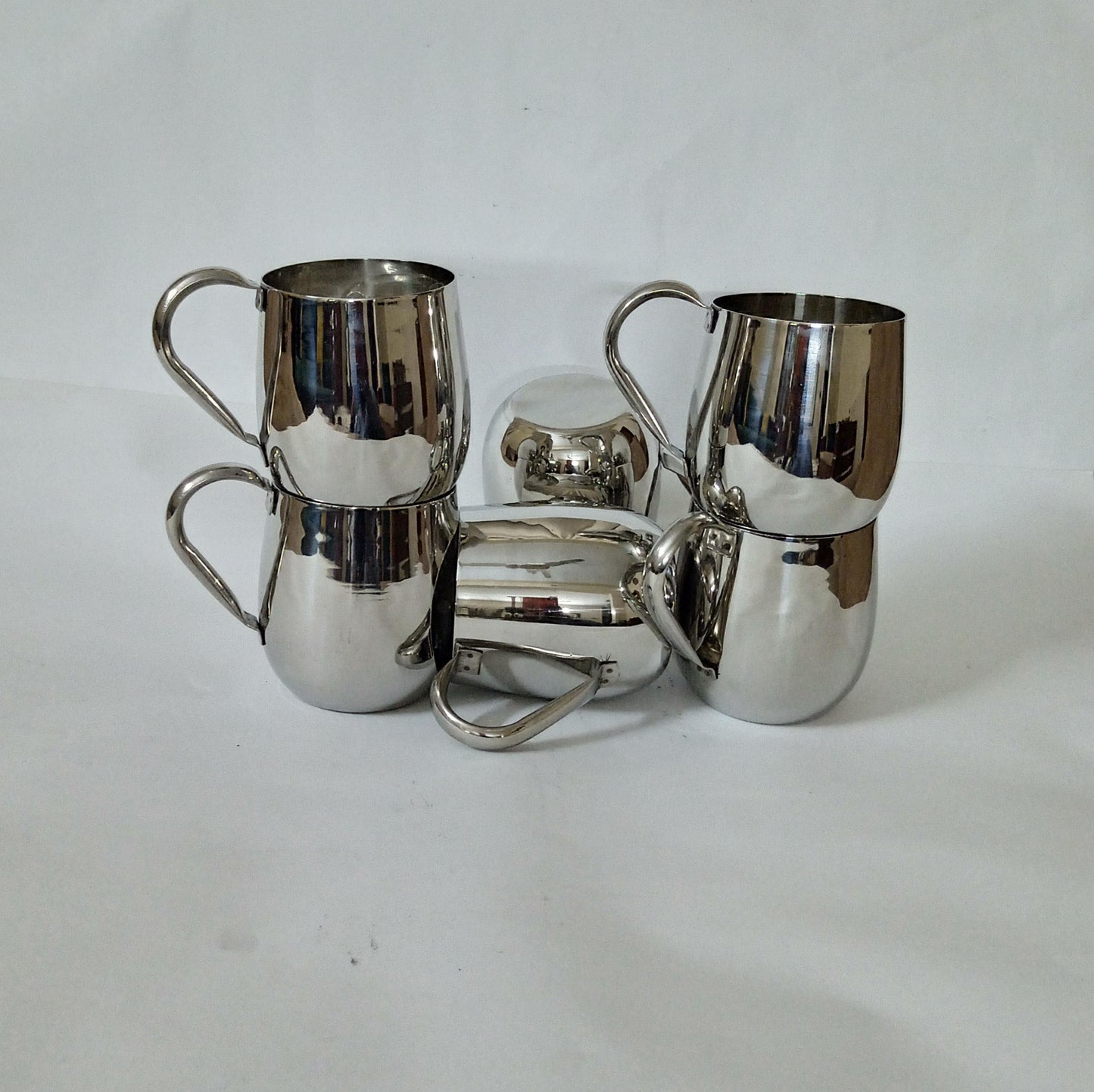 "Sip in Style: Elegant Silver Cup" Your Signature Handled Cup