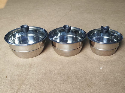 Stainless steel nesting bowl set with glass lid detail